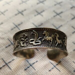 Silver Cuff Bracelet with Animal Signs Of The Zodiac Design
